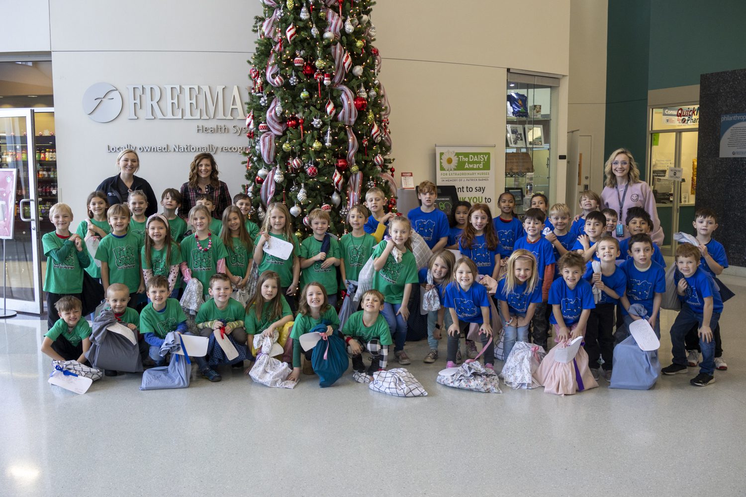 Neosho students bring toys to sick Freeman pediatric patients