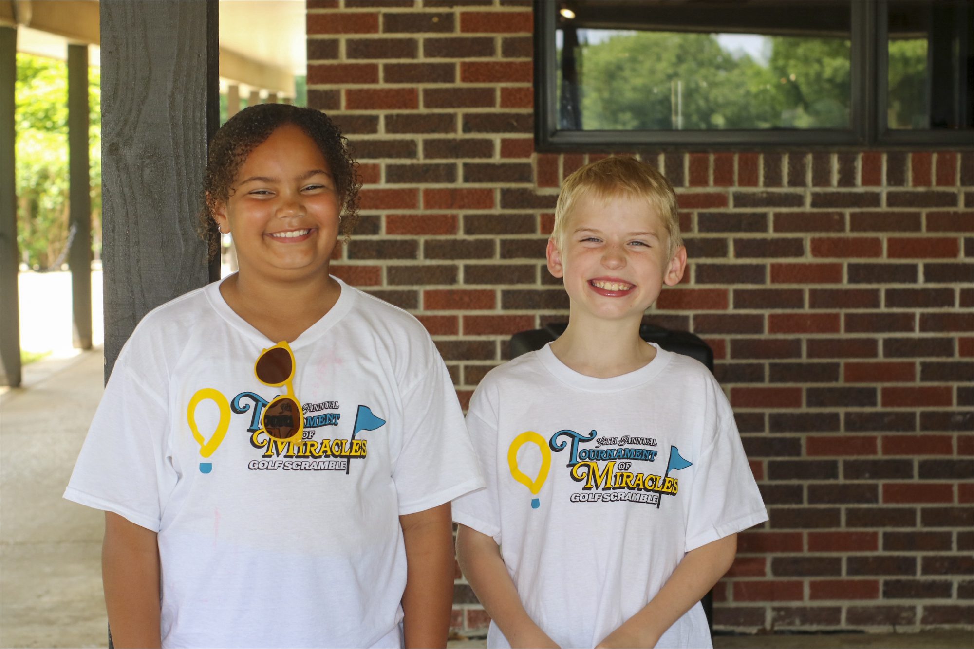 2026 CMN Champion Zakiyah Crow and 2024 CMN Ambassador Vincent Wilkowski were common sights throughout Twin Hills Country Club Monday as they interacted with competing golfing teams.